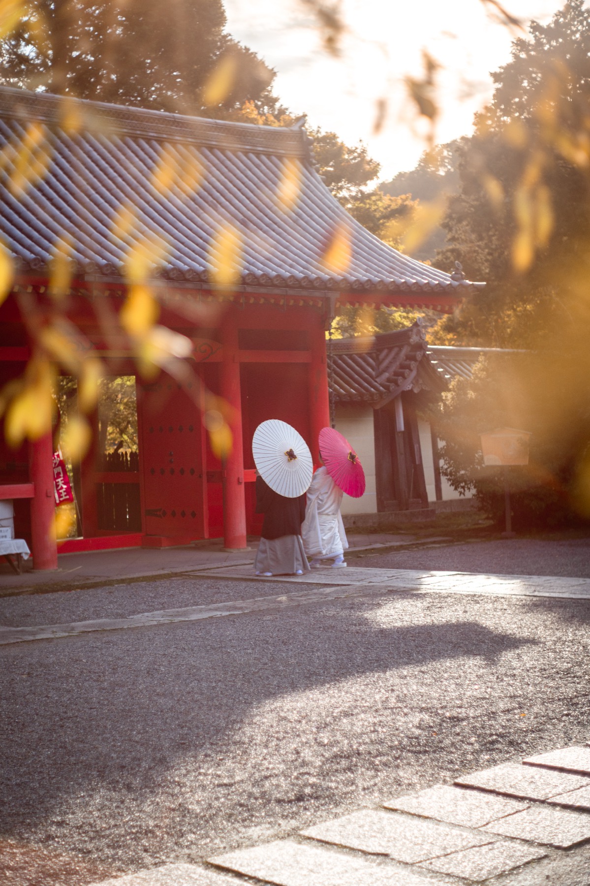 Temple with traditional umbrellas in golden light